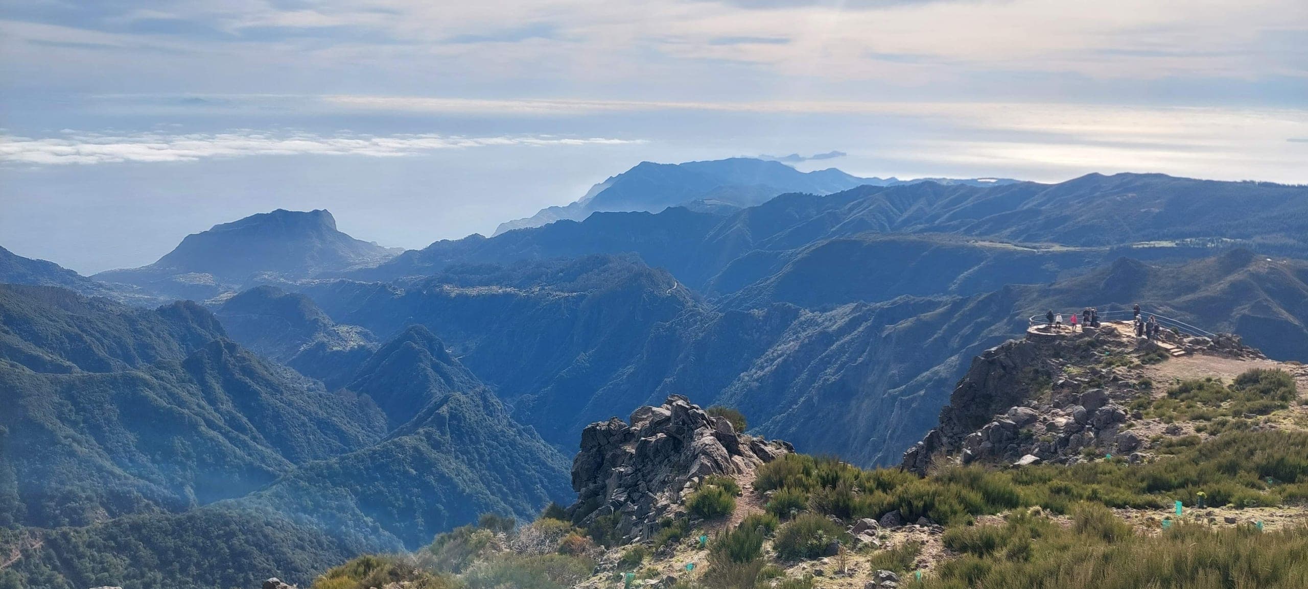 Layered mountain ridges above the clouds, seen from a high viewpoint in central Madeira