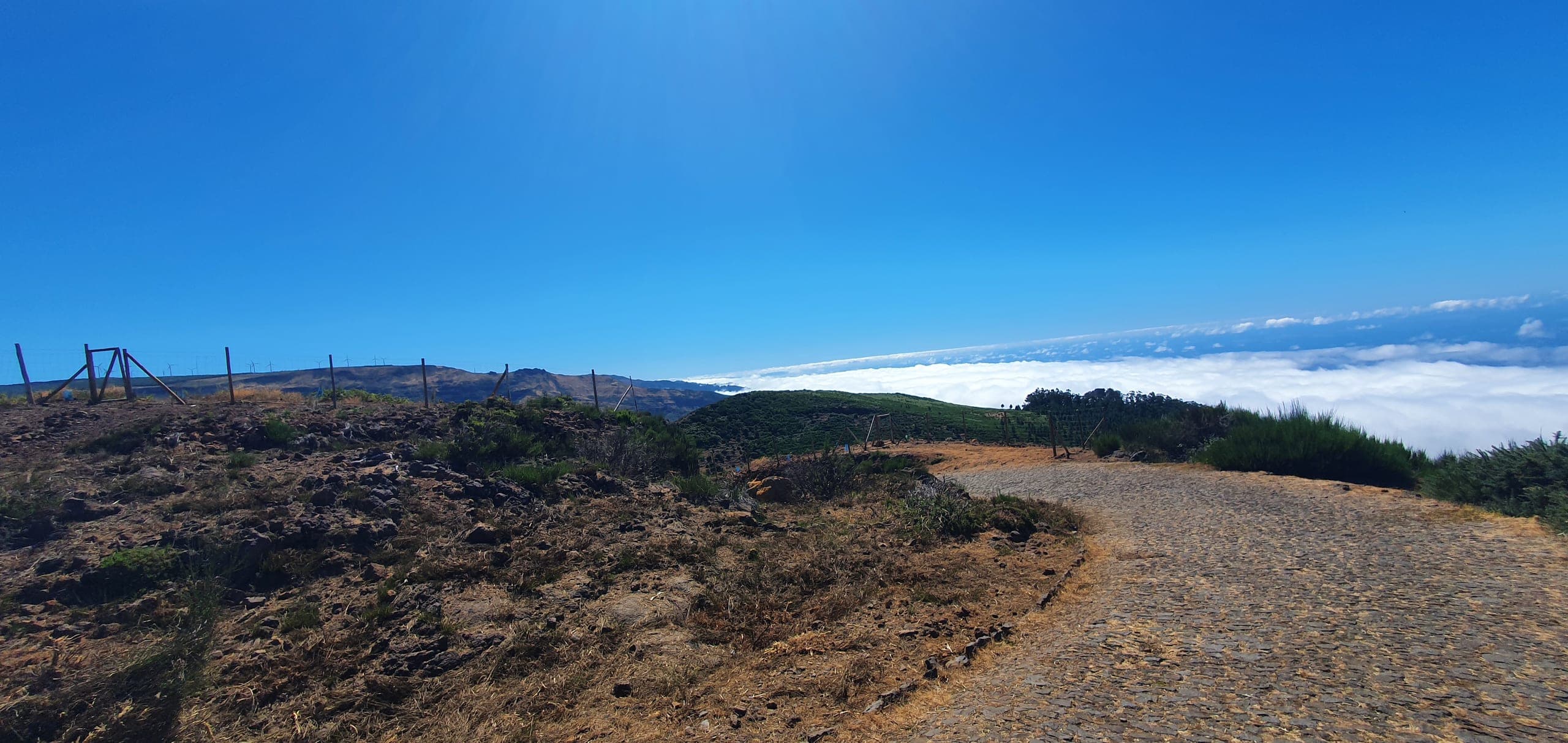 A cobbled track on the Paul da Serra plateau running out above a sea of clouds
