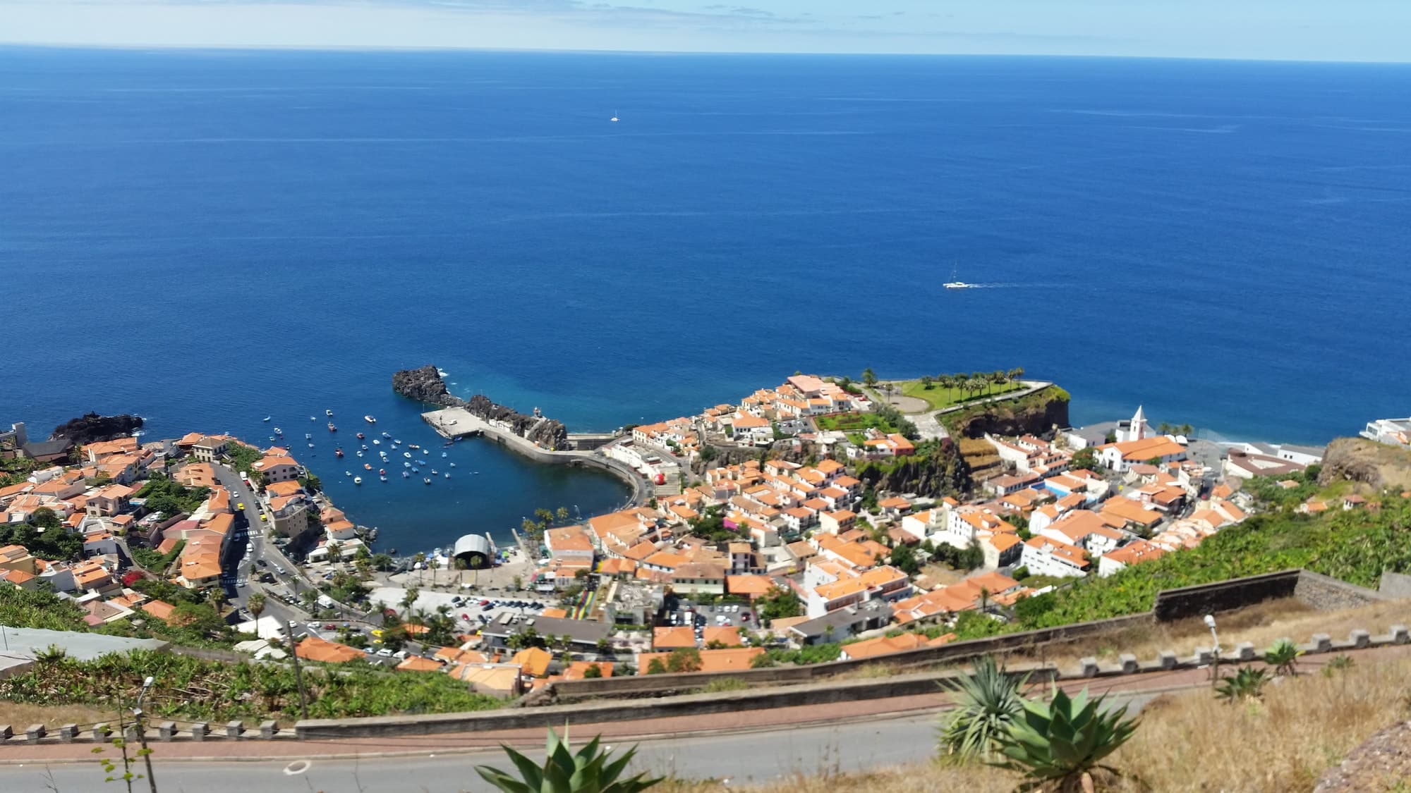 Aerial view over the fishing harbour of Câmara de Lobos